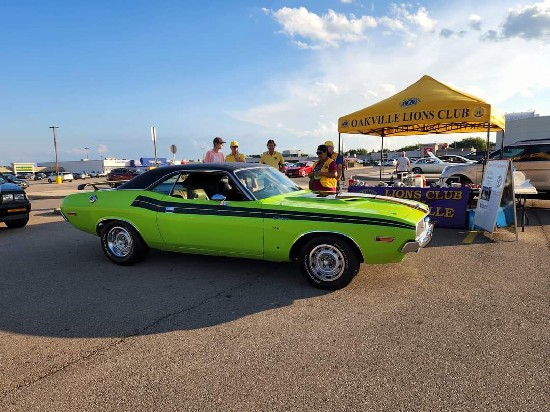 American classic muscle car attending Lions